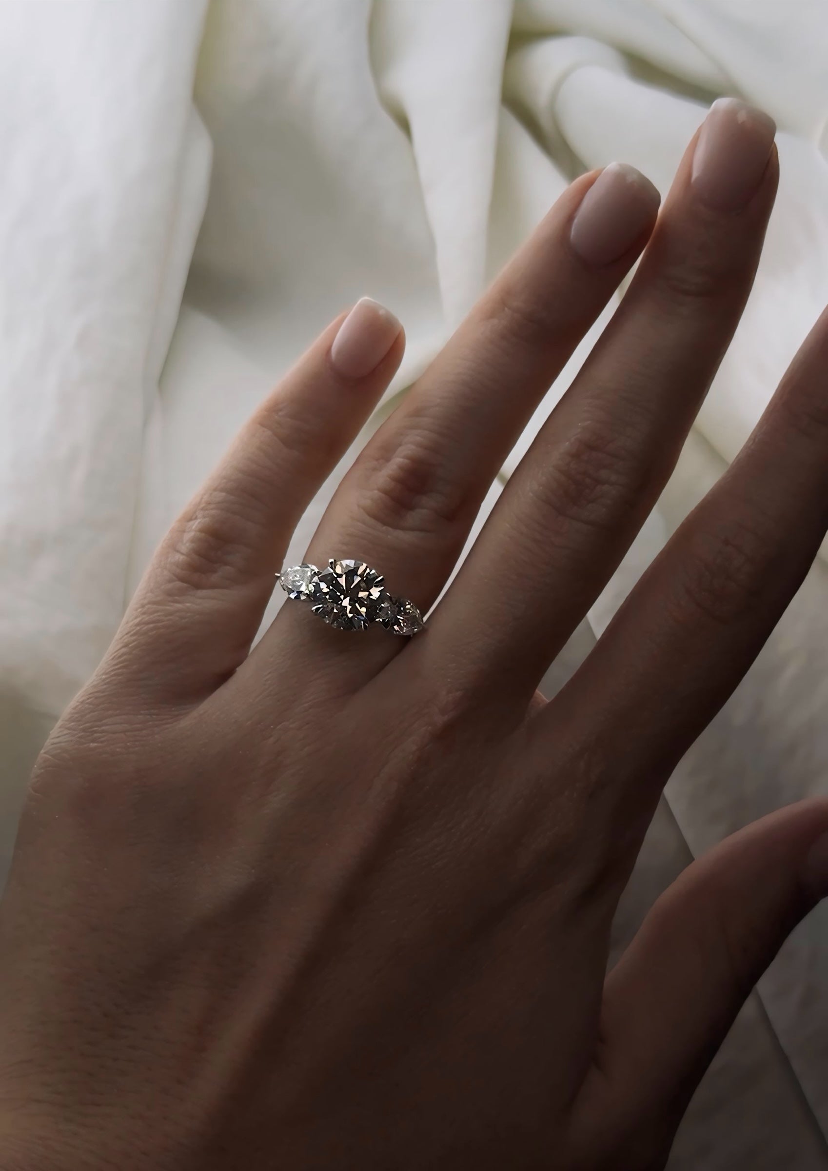 Round and Pear engagement Ring