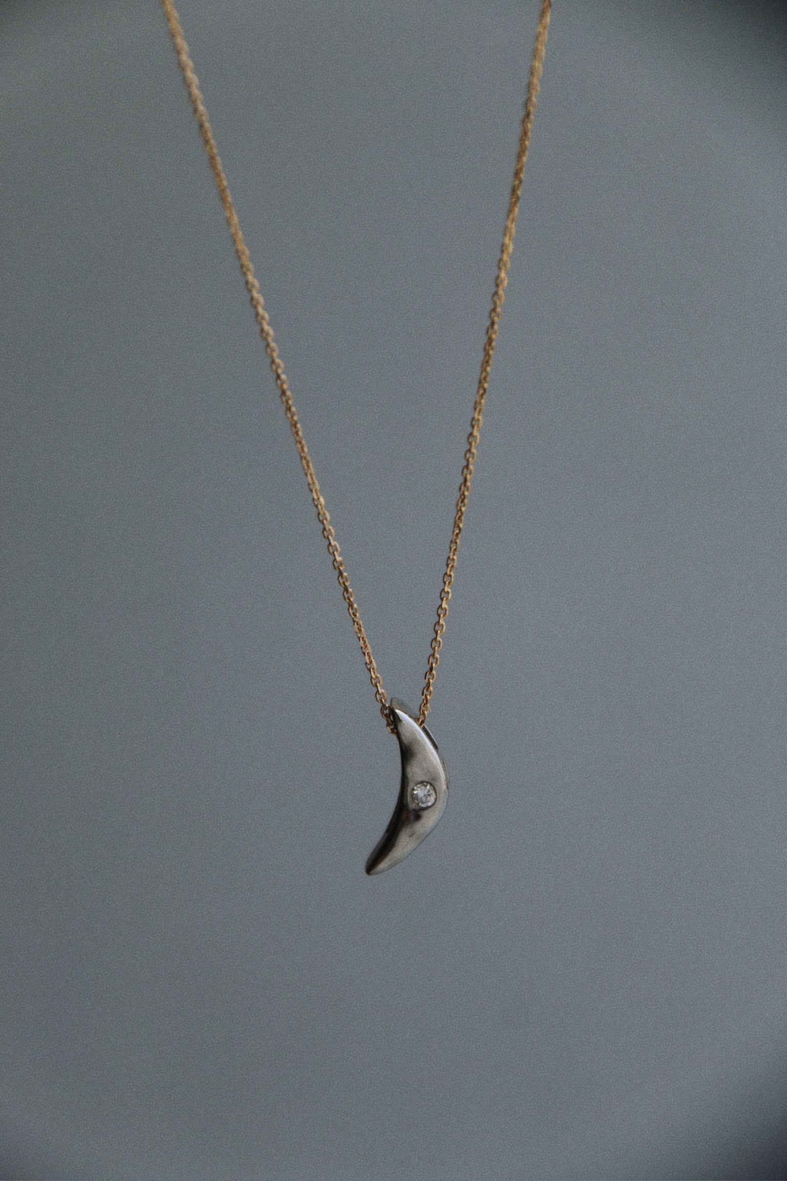 Custom two-tone 14k gold and diamond pendant