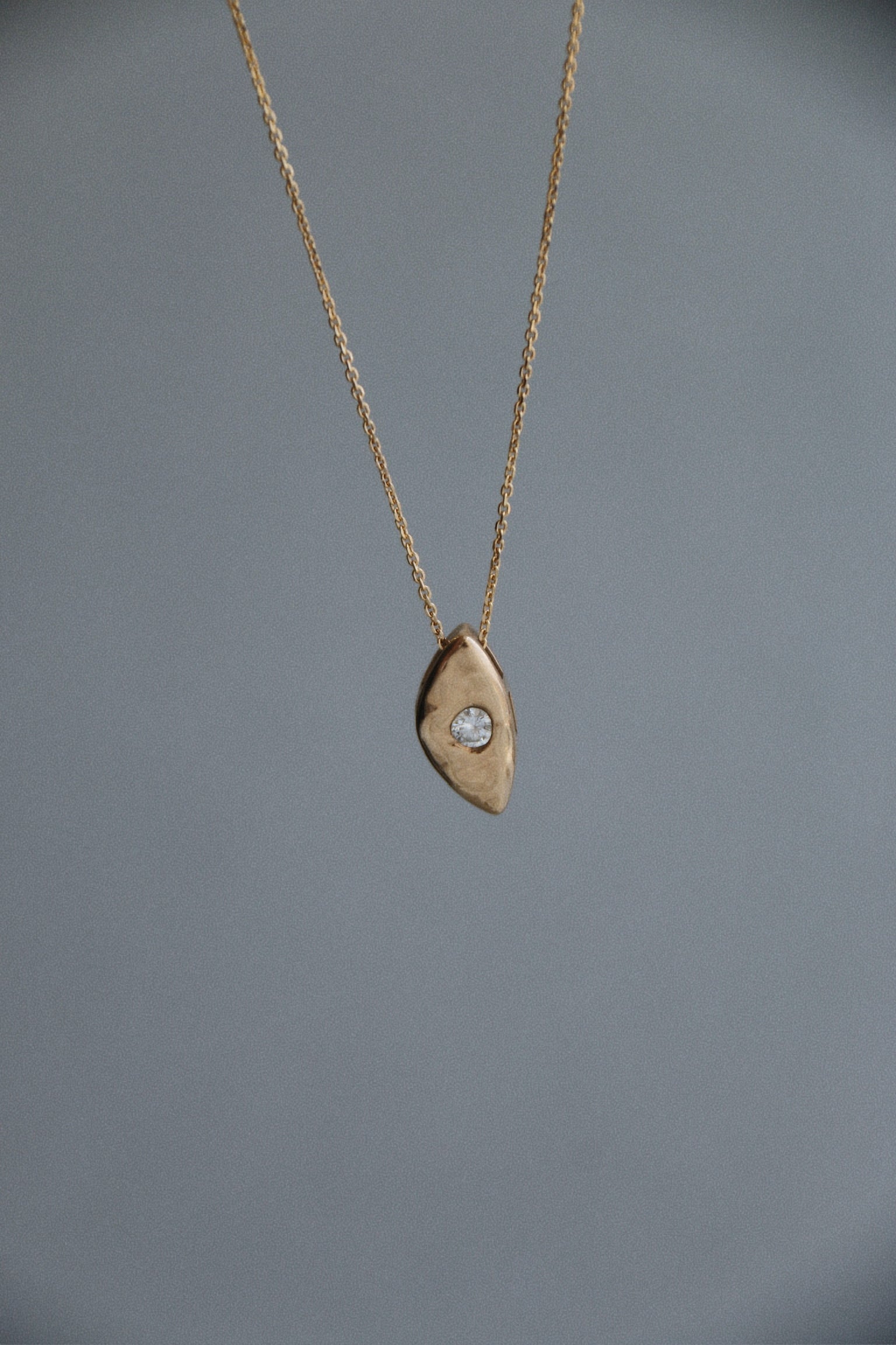 Custom two-tone 14k gold and diamond pendant