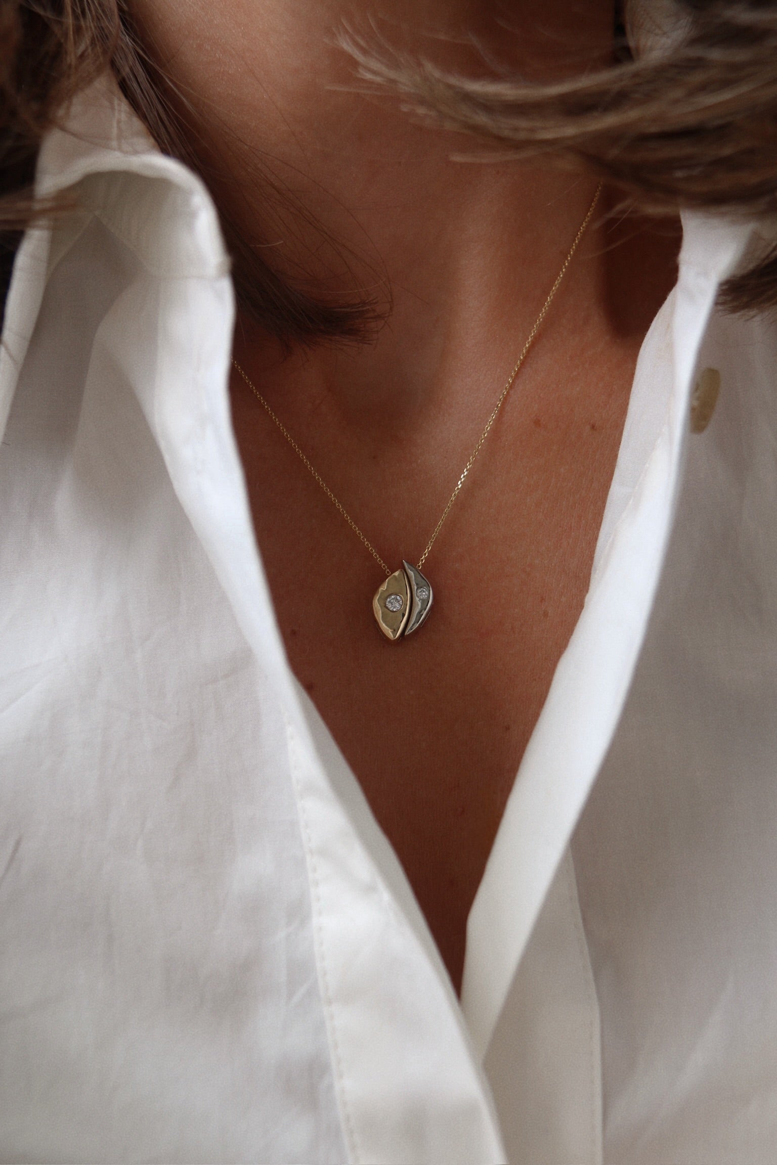 Custom two-tone 14k gold and diamond pendant