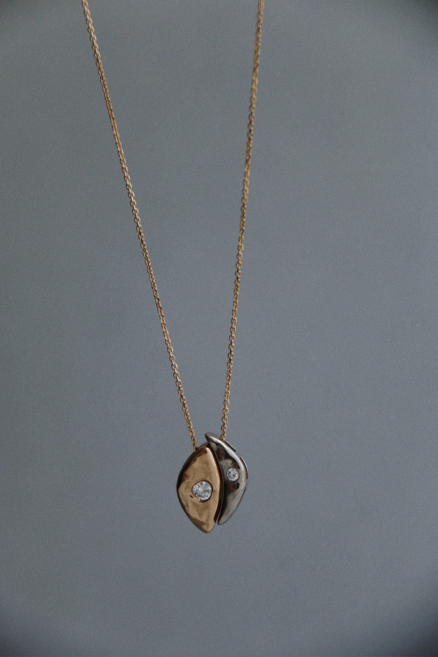 Custom two-tone 14k gold and diamond pendant