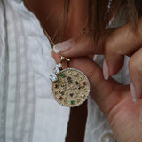 Graduated three diamond drop pendant in 14k gold, view 2