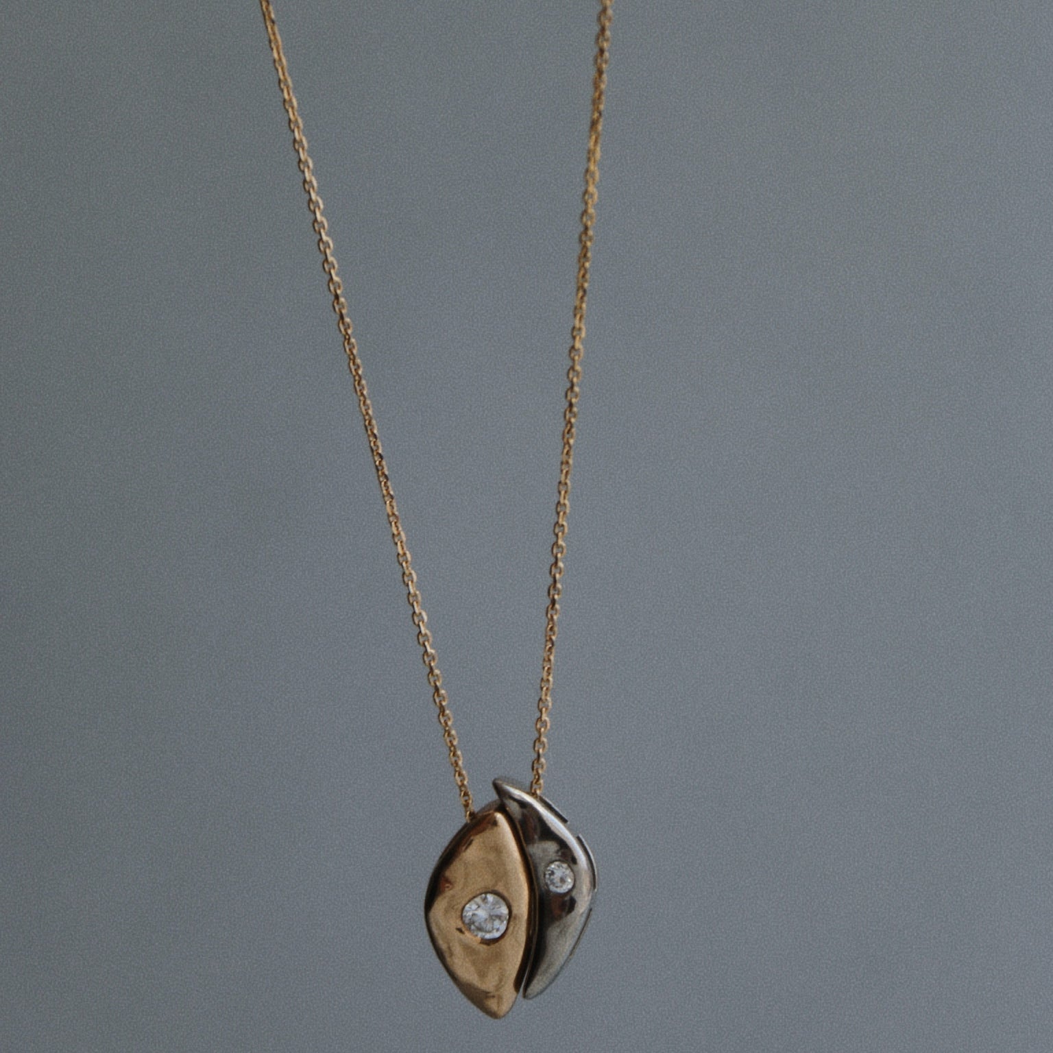 Custom two-tone 14k gold  and diamond pendant 